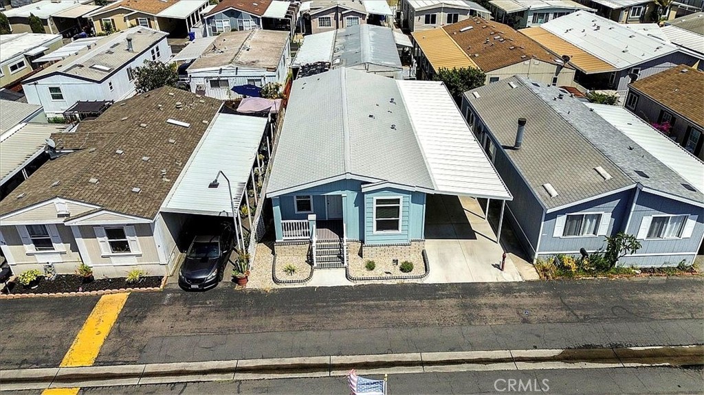 Drone View: Aerial perspective of the home’s location within Lincoln Center Mobile Home Park, an all-age Cypress communi - 9080 Bloomfield 231, Cypress CA 90630 - photo 5