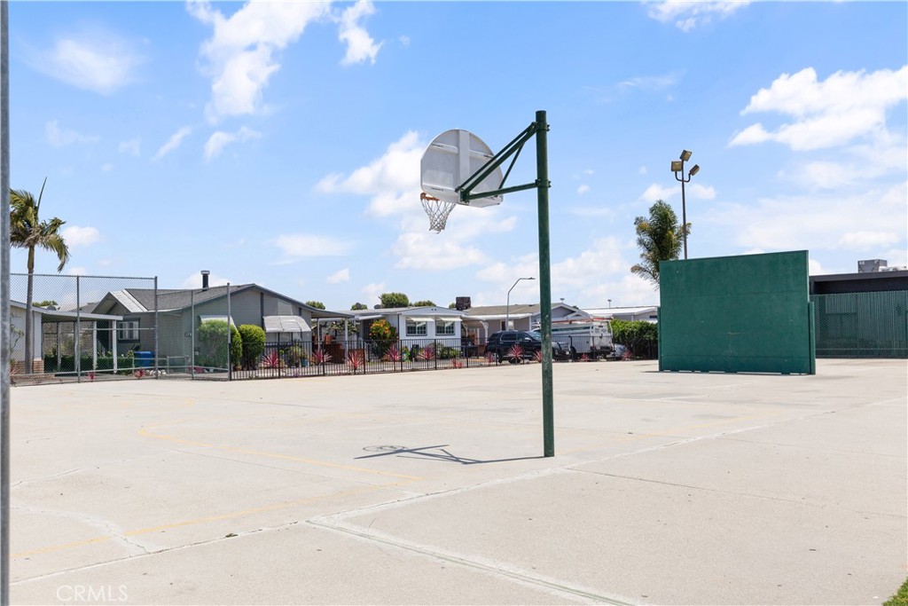 Outdoor basketball court in the community. - 9080 Bloomfield Avenue 153, Cypress CA 90630 - photo 25