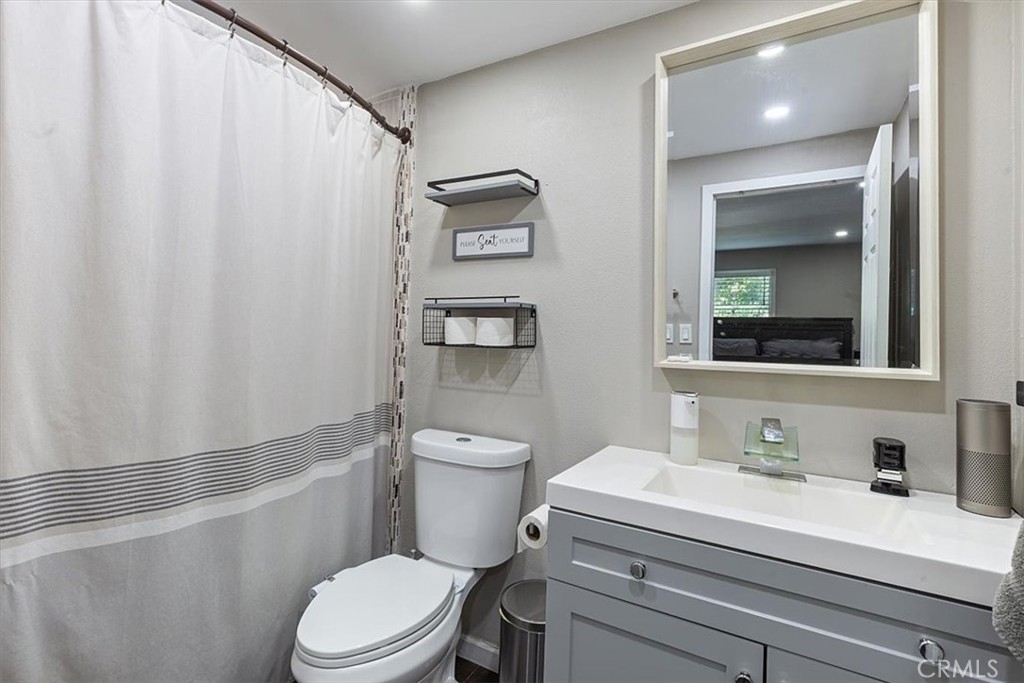 Second Bathroom: Roomy updated bathroom with shower/tub combo, modern vanity, and generous usable space. - 9080 Bloomfield Avenue 293, Cypress CA 90630 - photo 12