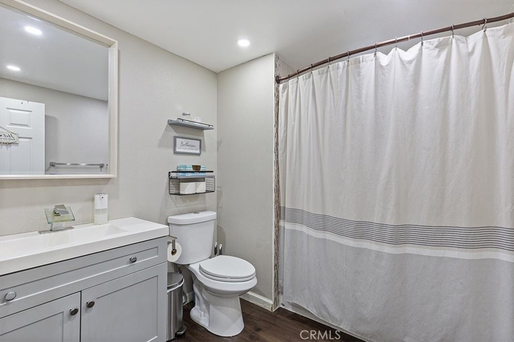 Second Bathroom: Roomy updated bathroom with shower/tub combo, modern vanity, and generous usable space. - 9080 Bloomfield Avenue 293, Cypress CA 90630 - photo 16