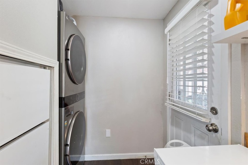 Laundry Area: Interior stackable washer/dryer space conveniently located near the kitchen and carport entry. - 9080 Bloomfield Avenue 293, Cypress CA 90630 - photo 21