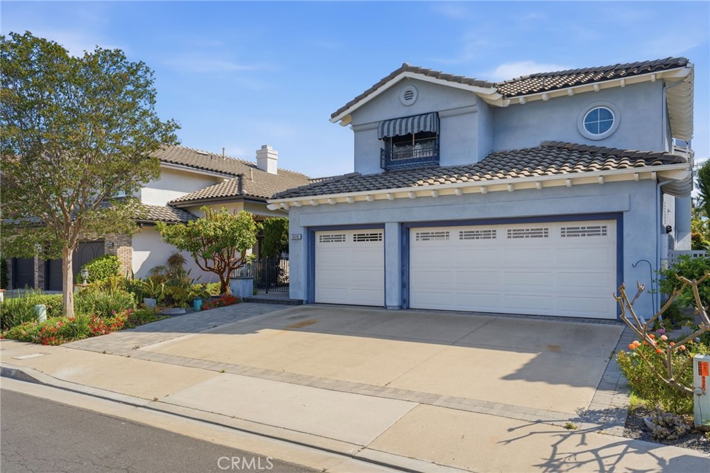 This Classic Plan Two offers 3 Car Garage, 3 bedrooms and 3 baths, thoughtfully designed with a main-level bedroom and b - 9916 Fonte, Cypress CA 90630 - photo 1