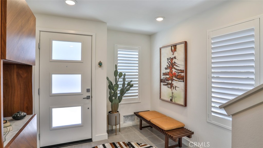 Foyer off of front patio and direct access from attached 3-car garage. - 1207 Doheny Way, Dana Point CA 92629 - photo 4