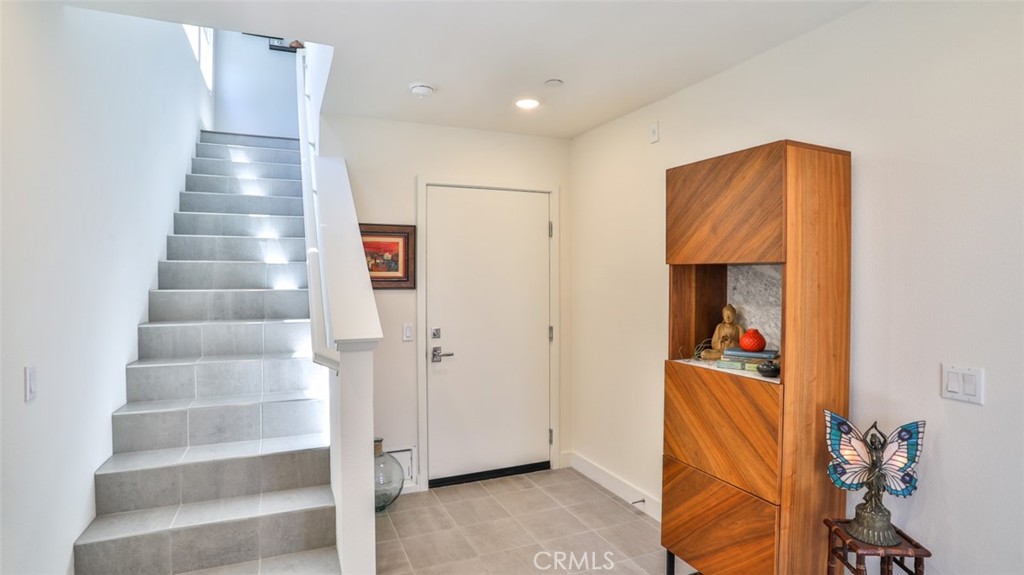 Foyer off of front patio and direct access from attached 3-car garage. - 1207 Doheny Way, Dana Point CA 92629 - photo 5