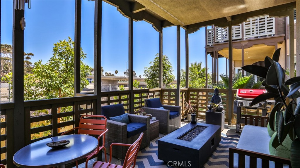 Deck off of living space. 1 of 2 outdoor areas. - 1207 Doheny Way, Dana Point CA 92629 - photo 22
