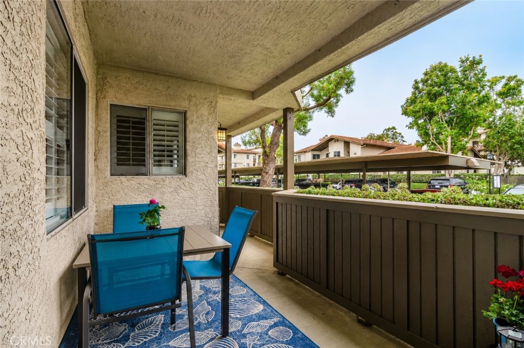 Digitally Altered Image – One patio chair has been digitally removed. Original photo follows. - 14 Corniche #A, Dana Point CA 92629 - photo 16