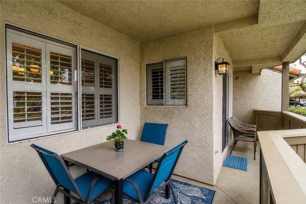 Digitally Altered Image – One patio chair has been digitally removed. Original photo follows. - 14 Corniche #A, Dana Point CA 92629 - photo 18