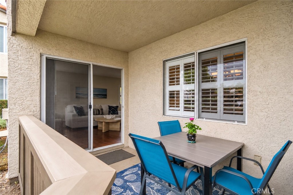 Digitally Altered Image – One patio chair has been digitally removed. Original photo follows. - 14 Corniche #A, Dana Point CA 92629 - photo 20