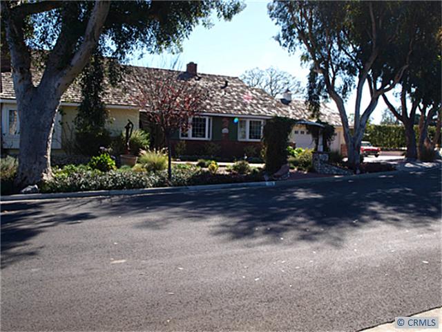 Wrap around front yard with beautiful trees . - 175 MONARCH BAY, Dana Point CA 92629 - photo 1