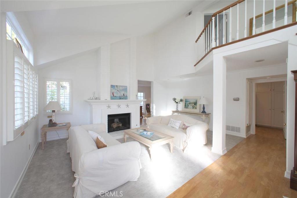 Welcoming Living Room with fireplace for those cool evenings - 19 Chelsea Pointe, Dana Point CA 92629 - photo 1