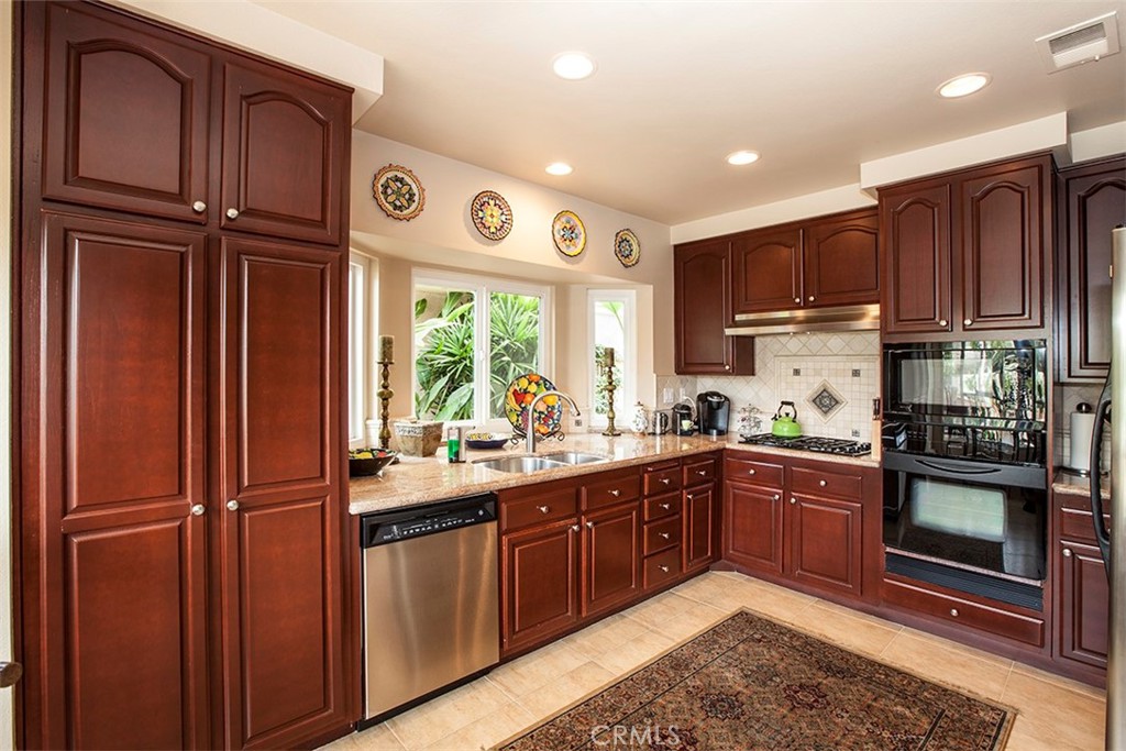 GORGEOUS KITCHEN WITH MAHOGANY/CHERRY CABINETS - 21 Saint John, Dana Point CA 92629 - photo 1