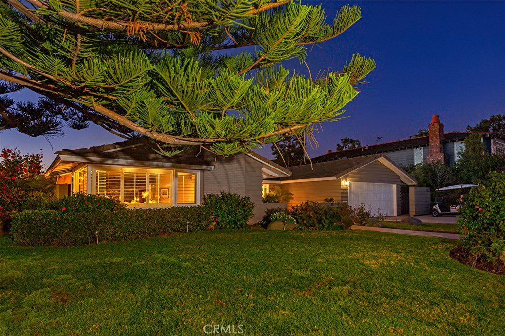 Welcome to 215 Monarch Bay which sits on a rare corner location in Monarch Bay community, offering you privacy and sunse - 215 Monarch Bay Drive, Dana Point CA 92629 - photo 1