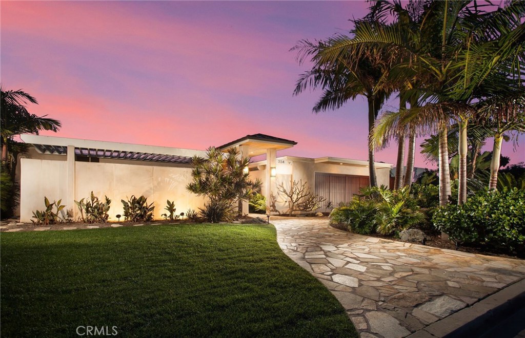 Twilight view captures stunning curb appeal of this soft contemporary Eichler style mid-century modern home - 224 Monarch Bay Drive, Dana Point CA 92629 - photo 1