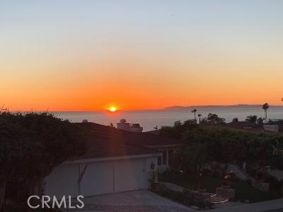 Amazing sun sets capturing beautiful Catalina Island from Living areas and master bedroom. - 22901 Via Orvieto, Dana Point CA 92629 - photo 1