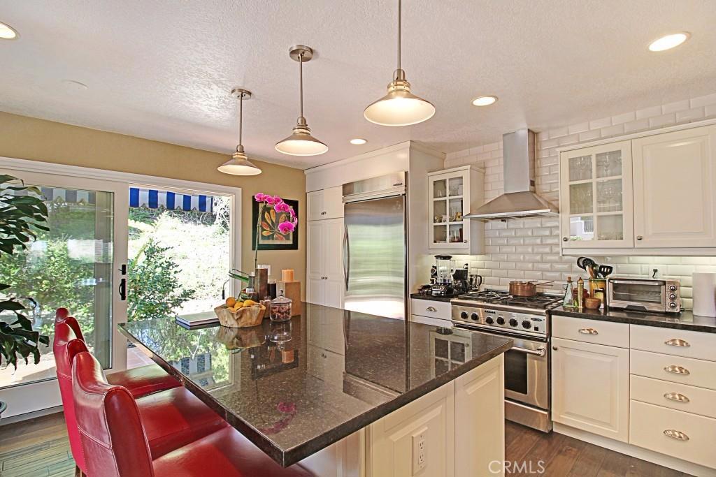 This beautiful chef's kitchen has all top of the line appliances and built in frig. - 23267 Atlantis Way, Dana Point CA 92629 - photo 1
