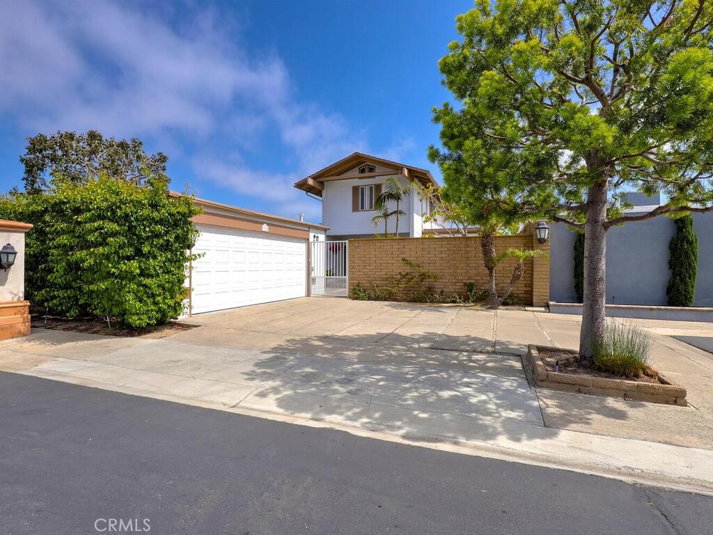 Dramatic 2 story Home with Private Courtyard and Spacious Driveway - 23622 Verrazanno Bay, Dana Point CA 92629 - photo 1