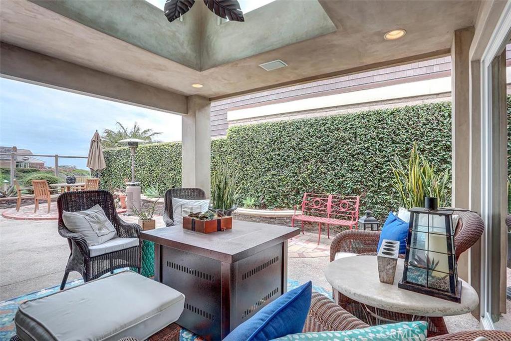Out door living spaces!!! Fan, speakers, and custom lighting. - 23652 Sidney Bay, Dana Point CA 92629 - photo 1