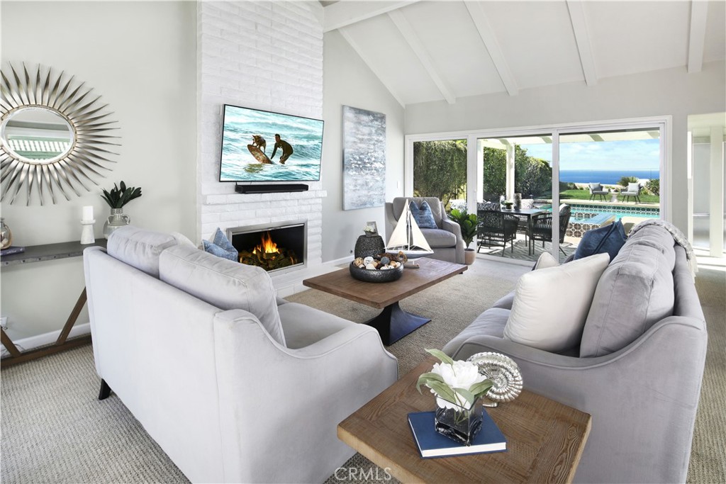 Living Room with Open-Beamed Ceilings and Fireplace with Amazing Ocean View - 23741 Montego Bay, Dana Point CA 92629 - photo 1