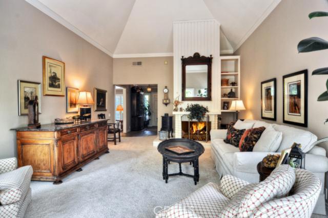Vaulted ceilings and a cozy fireplace make this living room a great space to relax. - 23822 Bluehill Bay, Dana Point CA 92629 - photo 1