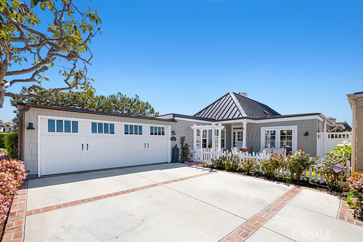 Front of home with Large Driveway for additional parking. - 23872 Marmara Bay, Dana Point CA 92629 - photo 1