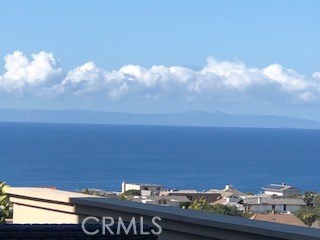 Catalina and ocean view from both patios (Dana Pt to left and Laguna Beach to righ), from Living rm, kitchen, dining rm, - 24111 Gourami Bay, Dana Point CA 92629 - photo 1