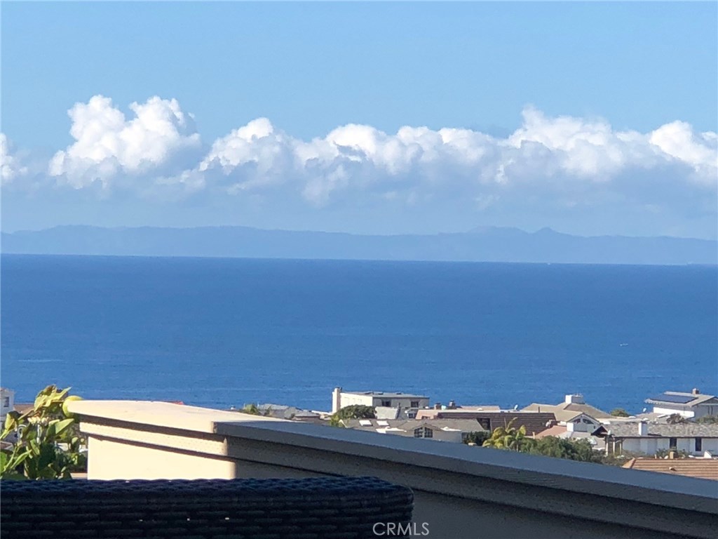 Catalina and ocean views from both patios (Dana Pt to left and Laguna Beach to right), from Living room, Kitchen, Dining - 24111 Gourami Bay, Dana Point CA 92629 - photo 1