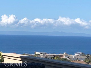 Catalina and ocean view from both patios (Dana Pt to left and Laguna Beach to righ), from Living rm, kitchen, dining rm, - 24111 Gourami Bay, Dana Point CA 92629 - photo 1
