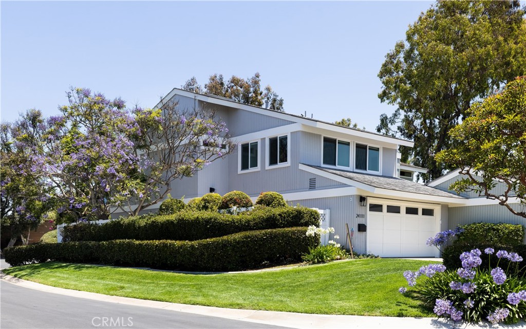 Fabulous corner lot with extra long driveway and gated wrap around leisure space. - 24111 Leeward Drive, Dana Point CA 92629 - photo 1