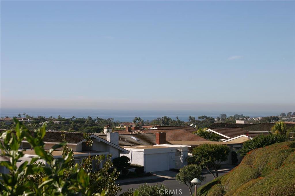 Welcome home to Gated Niguel Shores; views from both levels. - 24111 Windward Drive, Dana Point CA 92629 - photo 1