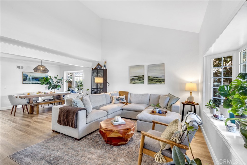 Bright cheery living and dining upon entering. Vaulted ceilings and charming window seat. - 24261 De Leon Drive, Dana Point CA 92629 - photo 6