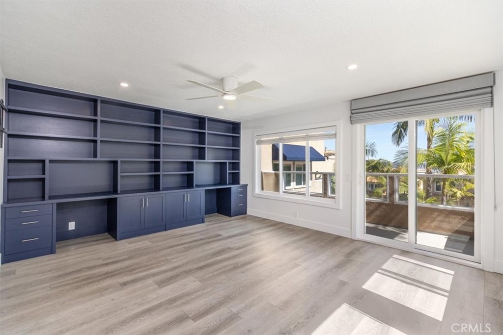 HOME OFFICE WITH CUSTOM BOOK SHELVES AND BUILT IN DESKS.. - 24345 Vista Point, Dana Point CA 92629 - photo 19