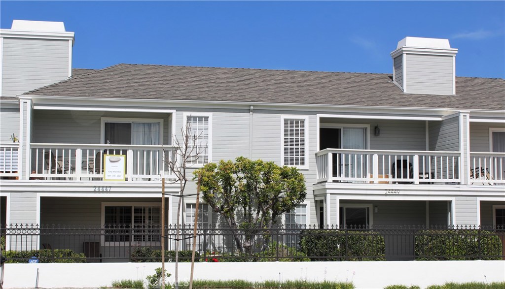 Townhome with Private Front Patio Entrance and upper Master Bedroom View Deck. Unit is to the left. - 24447 Santa Clara Avenue, Dana Point CA 92629 - photo 1
