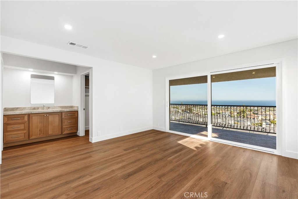 Lower Level Primary Suite - 24512 Alta Vista Dr B, Dana Point CA 92629 - photo 8