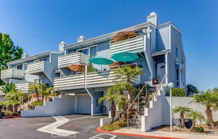 Beautifully furnished two level condo with one car garage access. Additonal parking in front of garage. Walk or bike to - 24561 D Harbor View Drive 13, Dana Point CA 92629 - photo 1