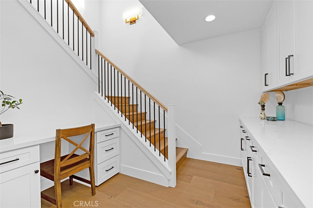 Stairs leading to 2 downstairs bedrooms and laundry - 24562 Polaris, Dana Point CA 92629 - photo 27