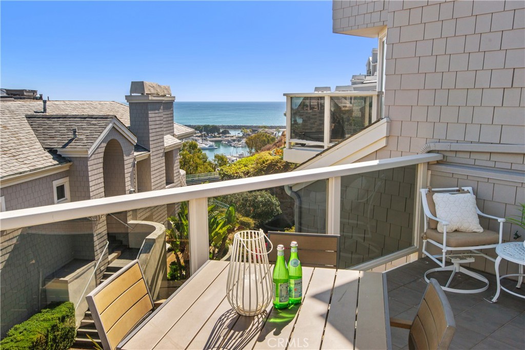 Enjoy ocean and harbor views from the family room, the primary deck, as well as the master bedroom patio. - 24582 Santa Clara Avenue, Dana Point CA 92629 - photo 1