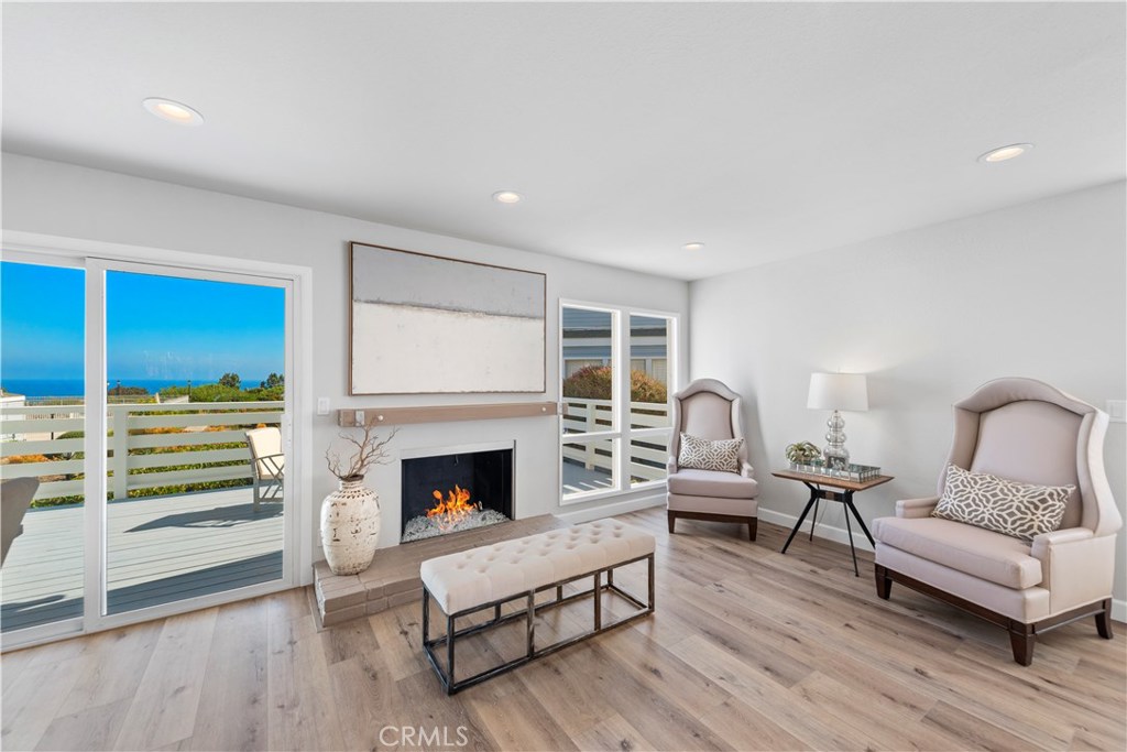 This completely renovated home offers a stunning sit down ocean view from the living room, dining room, kitchen, master - 24592 Harbor View Drive A, Dana Point CA 92629 - photo 1