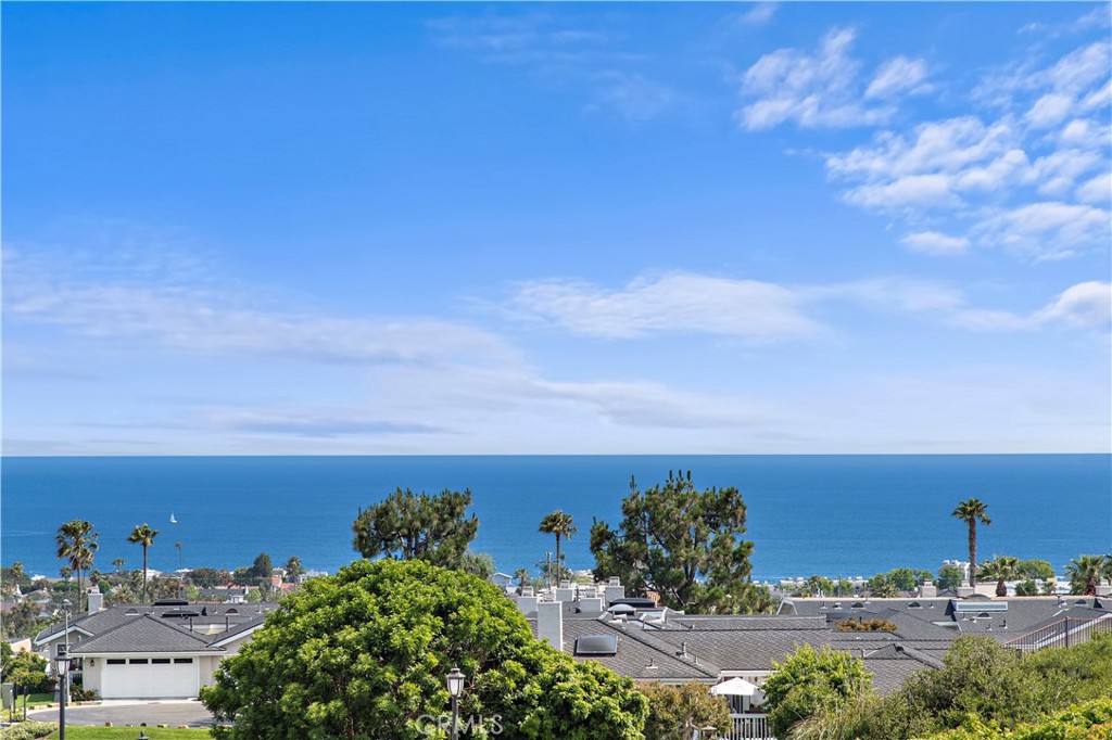 Immerse yourself in the breathtaking 180-degree ocean view, where the beauty of sailboats gracing the horizon becomes a - 24592 Harbor View Drive B, Dana Point CA 92629 - photo 1