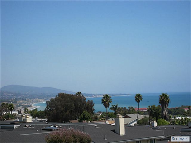 Panoramic coastline - 24606 MOONFIRE Drive 276, Dana Point CA 92629 - photo 1