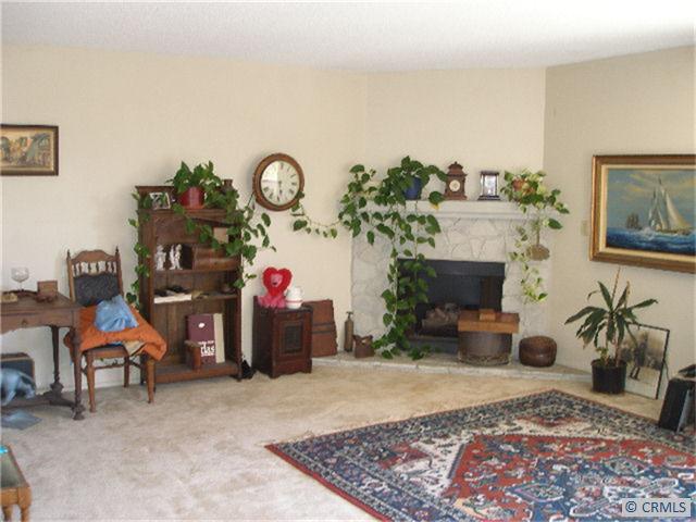Living room with gas log fireplace - 24641 CORDOVA Drive lower, Dana Point CA 92629 - photo 1