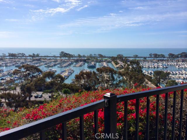 Just a few houses down is this spectacular scenic view of the harbor. - 24719 Santa Clara Avenue 8, Dana Point CA 92629 - photo 1