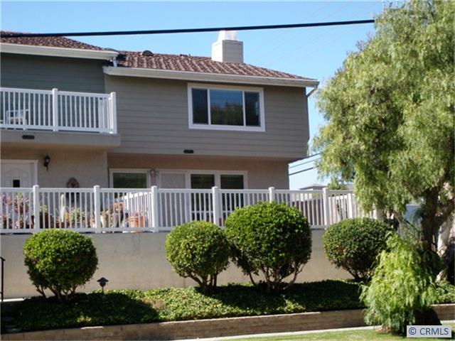 Front view of condo with huge sunny deck and end unit location. - 24719 SANTA CLARA Avenue 8, Dana Point CA 92629 - photo 1