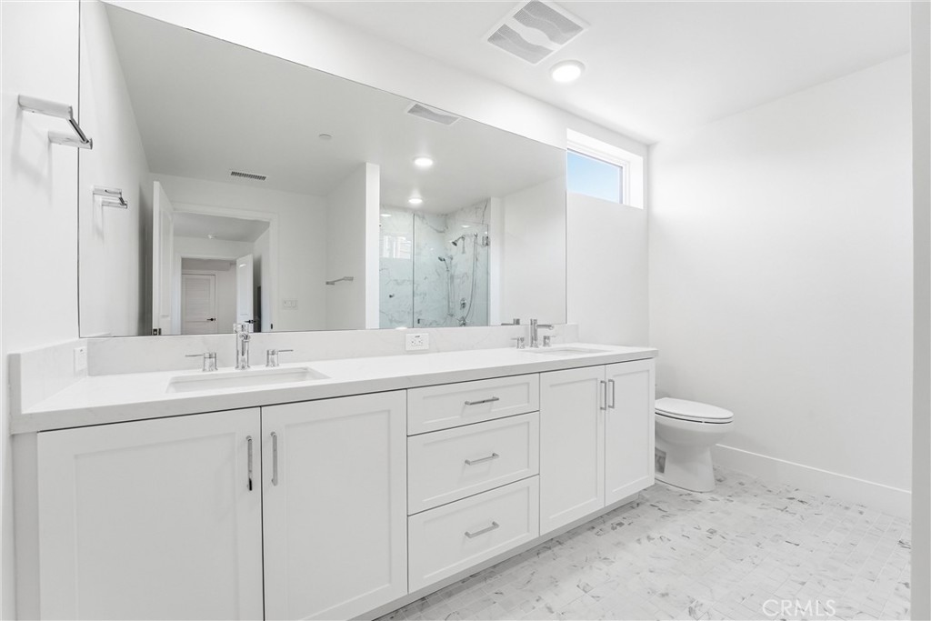 Primary Bath 2 sinks - 24722 Del Prado 201, Dana Point CA 92629 - photo 18