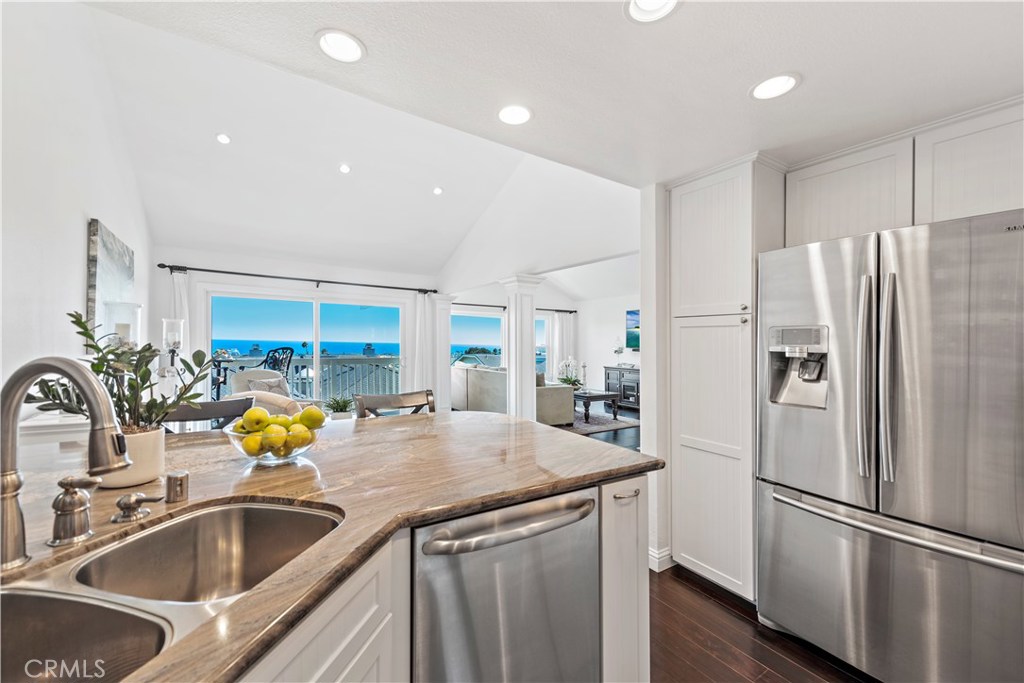 Kitchen Views to sitting area, living room, and balcony - 24742 Sea Shell Way, Dana Point CA 92629 - photo 1