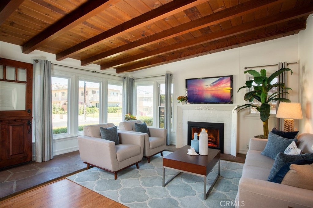 Enter into light and bright living room w/ gas fireplace - 24762 La Cresta Drive, Dana Point CA 92629 - photo 1