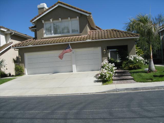 Front of house with three car garage! - 24886 Summerwind, Dana Point CA 92629 - photo 1