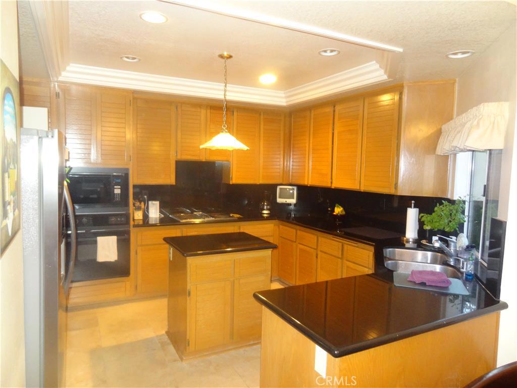 Huge upgraded kitchen with Center Island, recessed lighting & windows to poor natural light in - 24975 Seagate Drive, Dana Point CA 92629 - photo 1