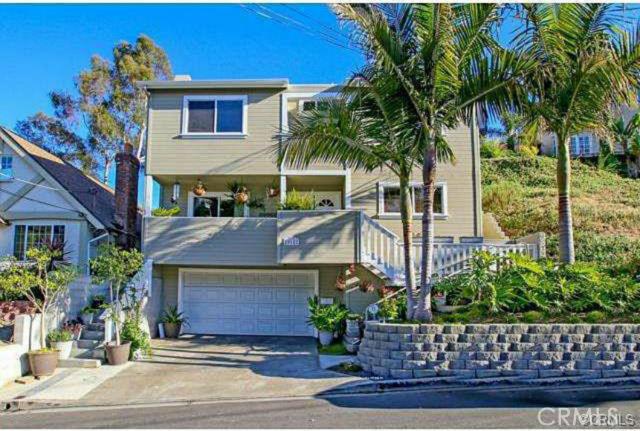 Gorgeous curb appeal! This SFR boasts 2 car garage with parking in front. To the right is an empty lot which only adds t - 25182 Manzanita Drive, Dana Point CA 92629 - photo 1