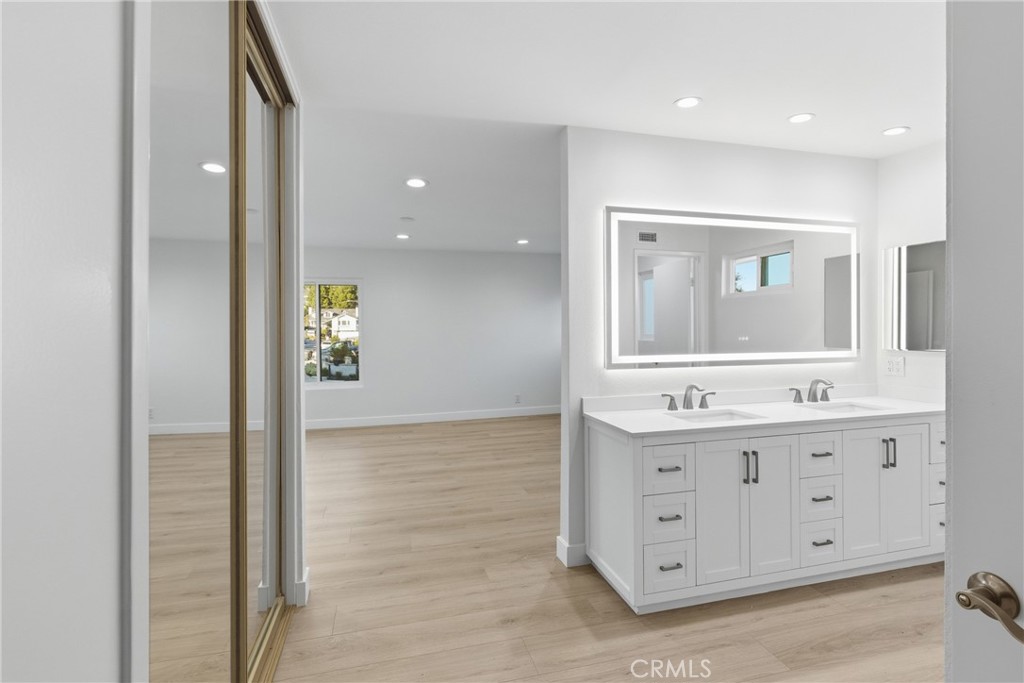 Primary Bedroom and Bath with double sinks. - 25302 Neptune Drive, Dana Point CA 92629 - photo 13