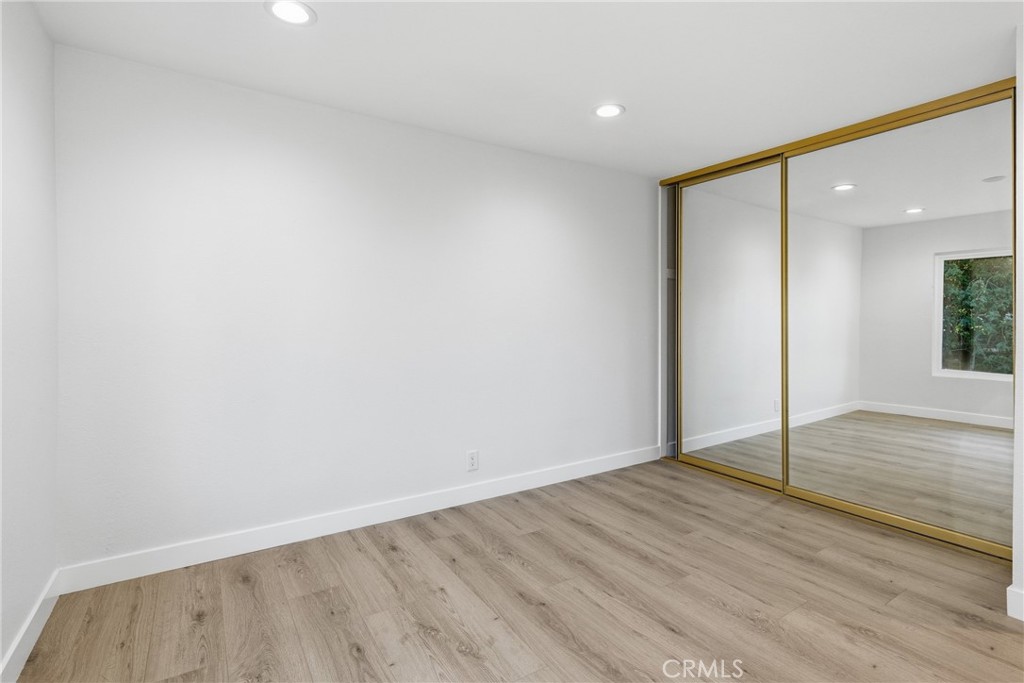 Second Bedroom with Mirror Doors. - 25302 Neptune Drive, Dana Point CA 92629 - photo 17